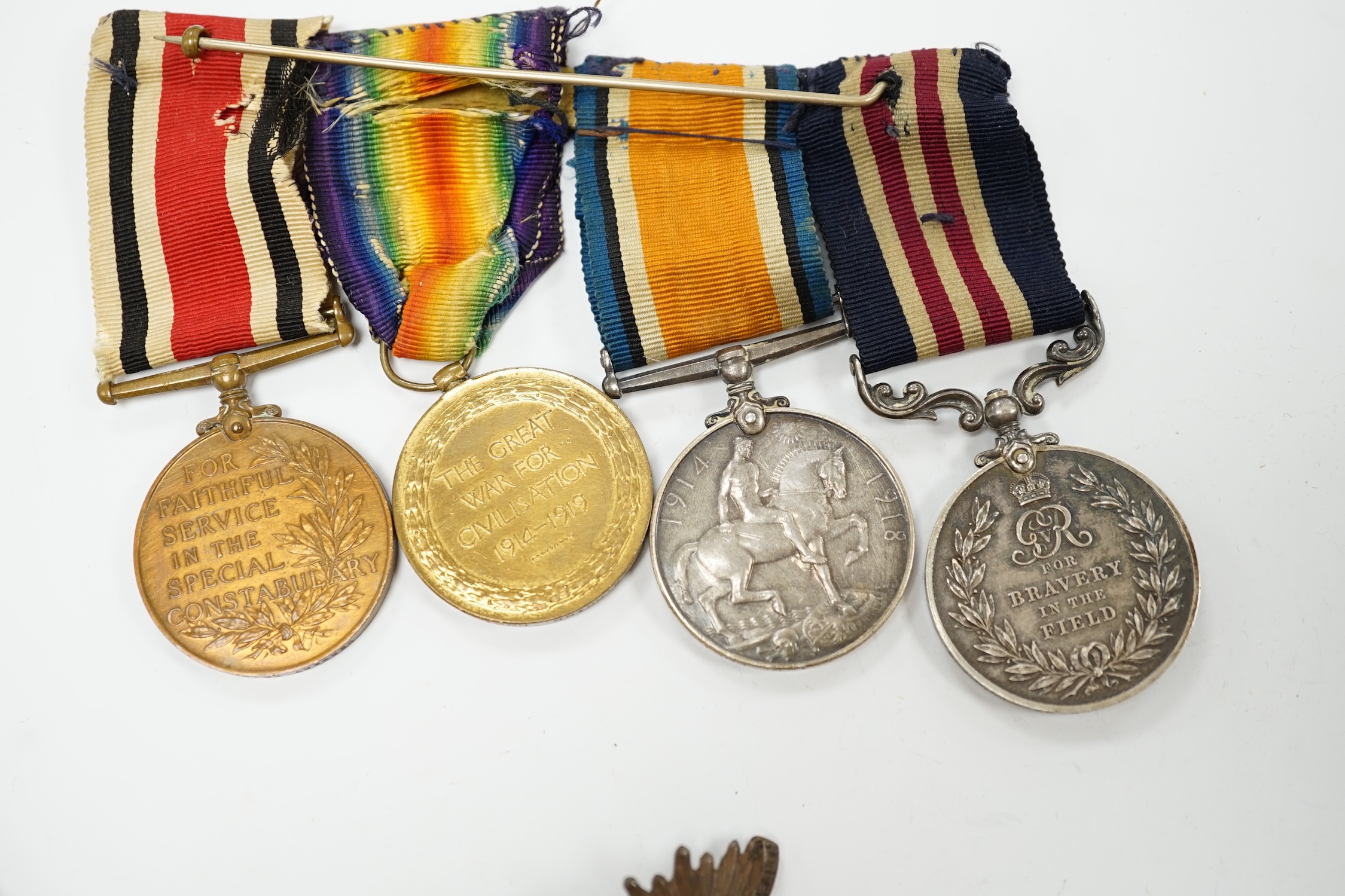 Two First World War medal groups; a military medal group awarded to Pte. H.S. Cribb, 23rd Northumberland Fusiliers, comprising; the Military Medal for Bravery in the Field, the Special Constabulary Medal, the War Medal a